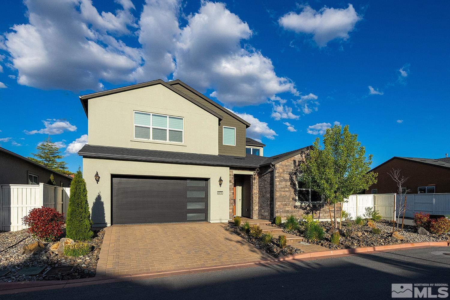 5414 Cremello Way Reno, NV 89511 - Photo 3 of 40 a front view of a house with yard