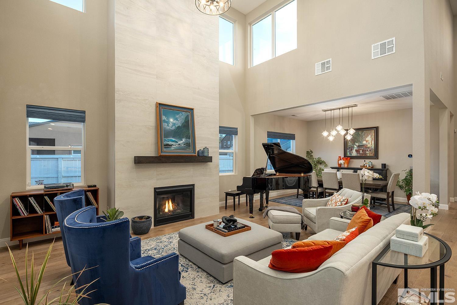 5414 Cremello Way Reno, NV 89511 - Photo 7 of 40 a living room with furniture fireplace and window