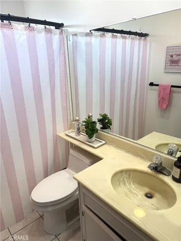 a bathroom with a sink and toilet