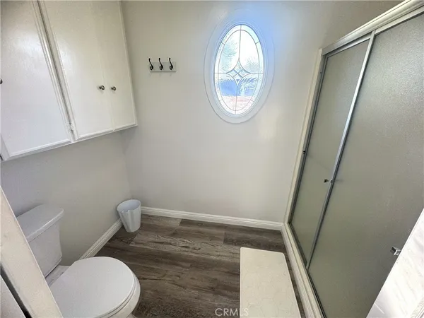 a bathroom with a toilet and a sink