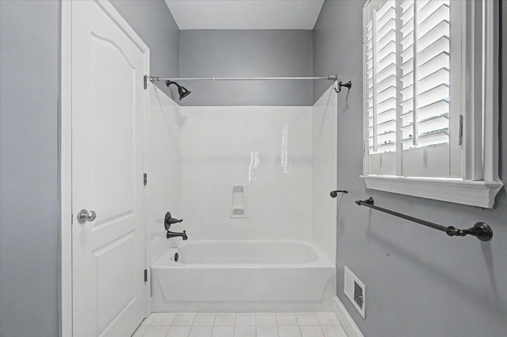 122 Ridge View Drive Ball Ground, GA 30107 - Photo 33 of 84 a bathroom with a bathtub and a shower