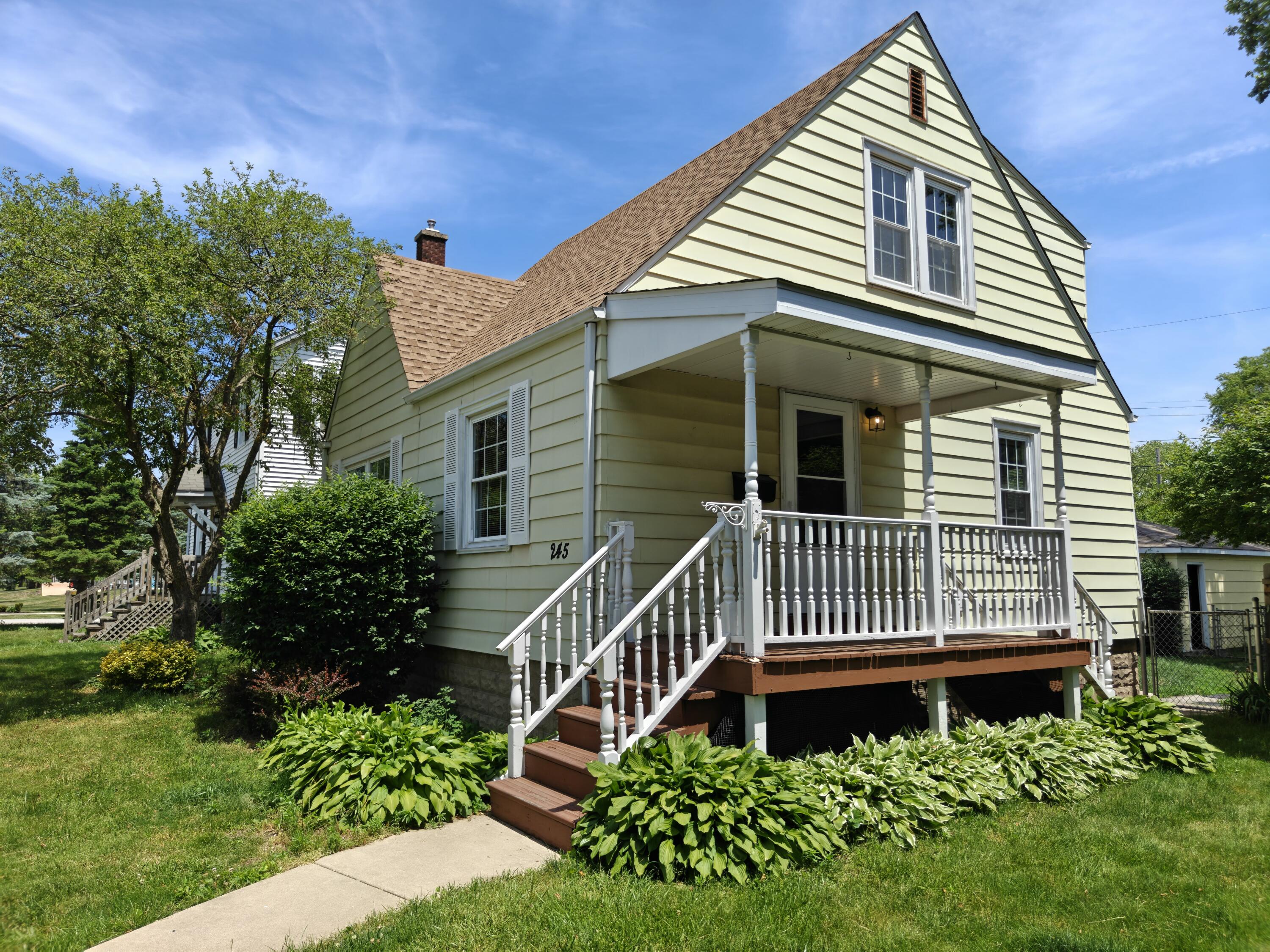 245 North Indiana Street Griffith, IN 46319 - Photo 1 of 30 a view of a house with a small yard