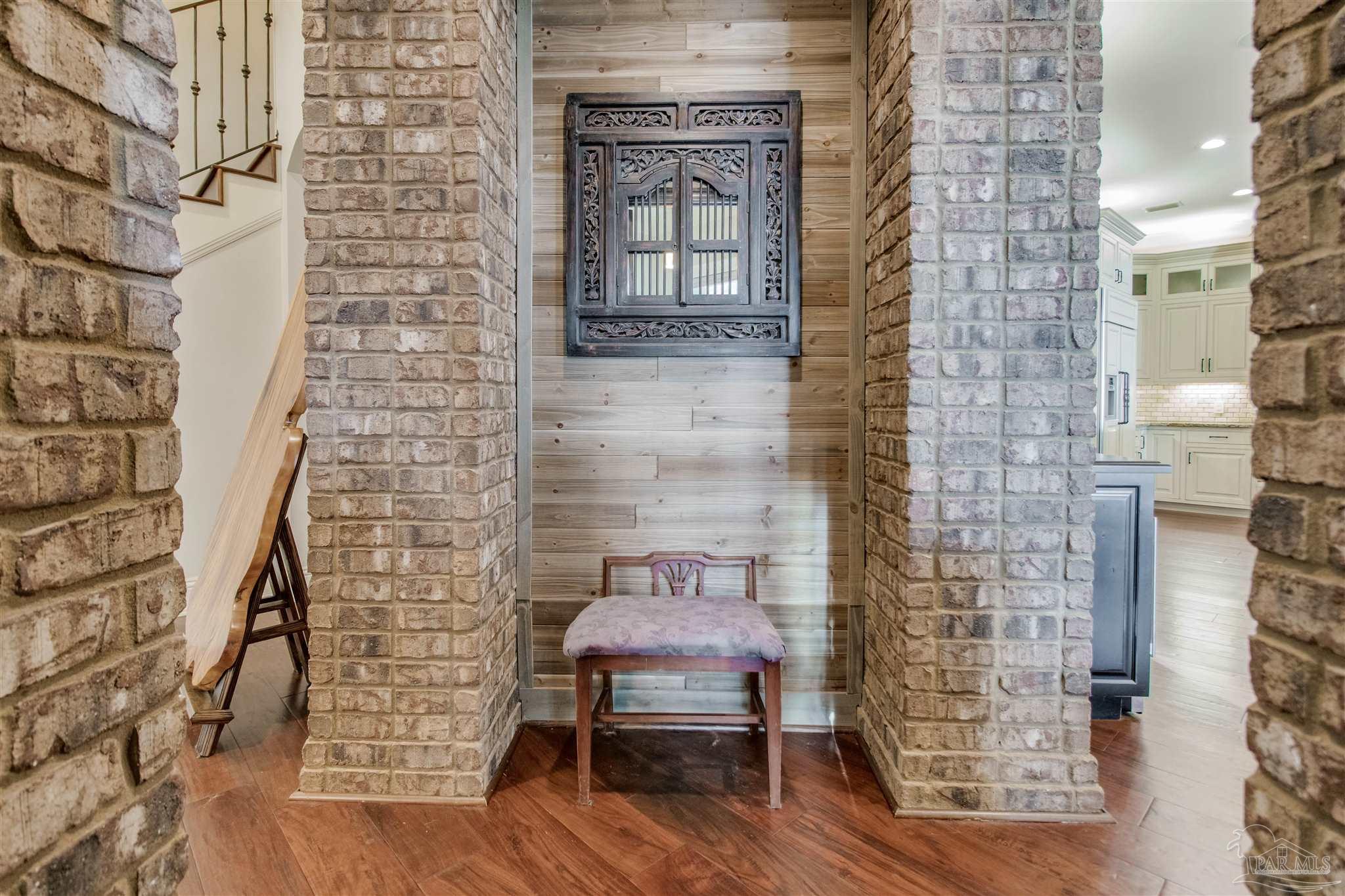 5113 Soundside Drive Gulf Breeze, FL 32563 - Photo 17 of 72 between formal living/dining and kitchen/family rm