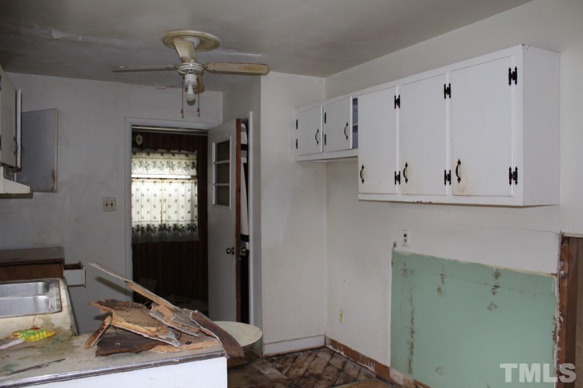 1811 Charles Street Raleigh, NC 27610 - Photo 6 of 16 a room with storage and utility