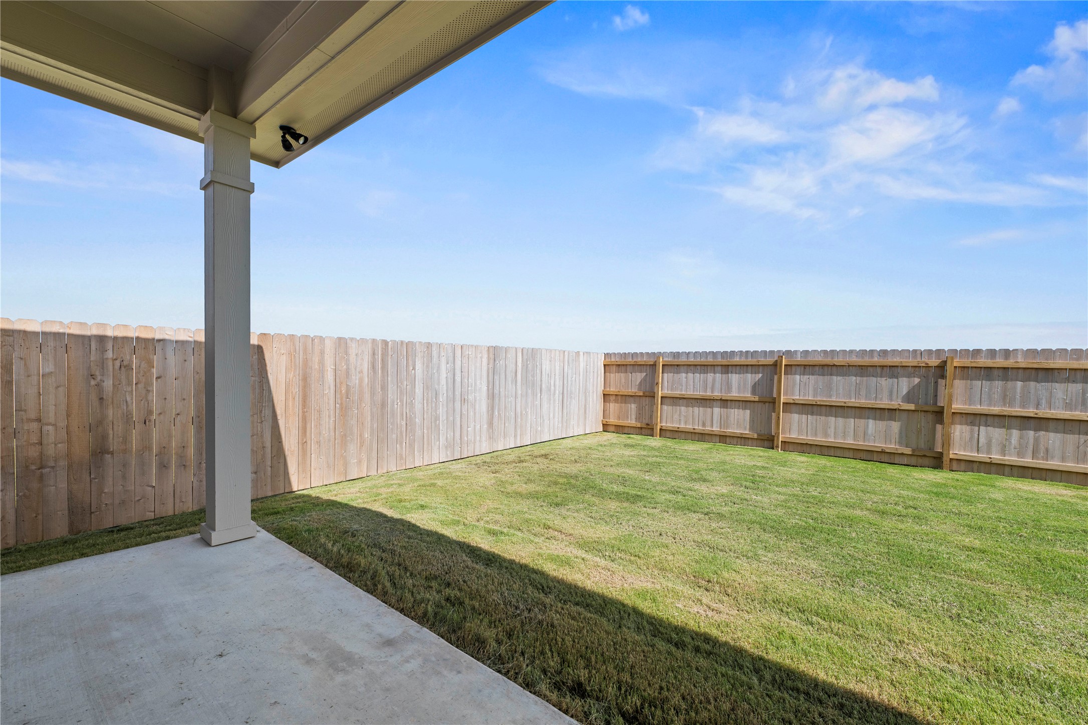 220 Gus Loop Georgetown, TX 78626 - Photo 17 of 18 A spacious, enclosed backyard offers abundant room for outdoor enjoyment and privacy.