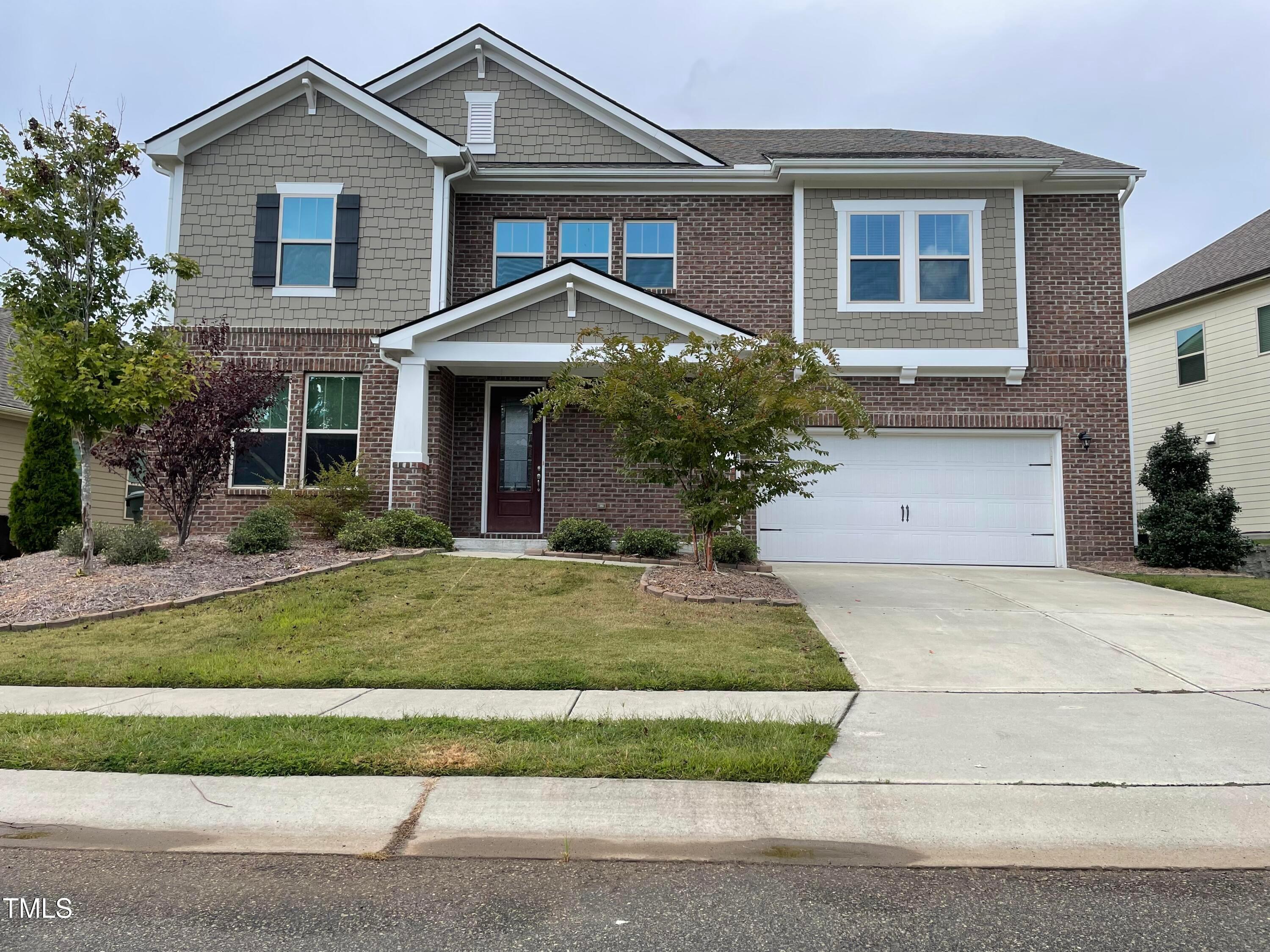1809 Capstone Drive Durham, NC 27713 - Photo 2 of 35 front view of a house with a yard
