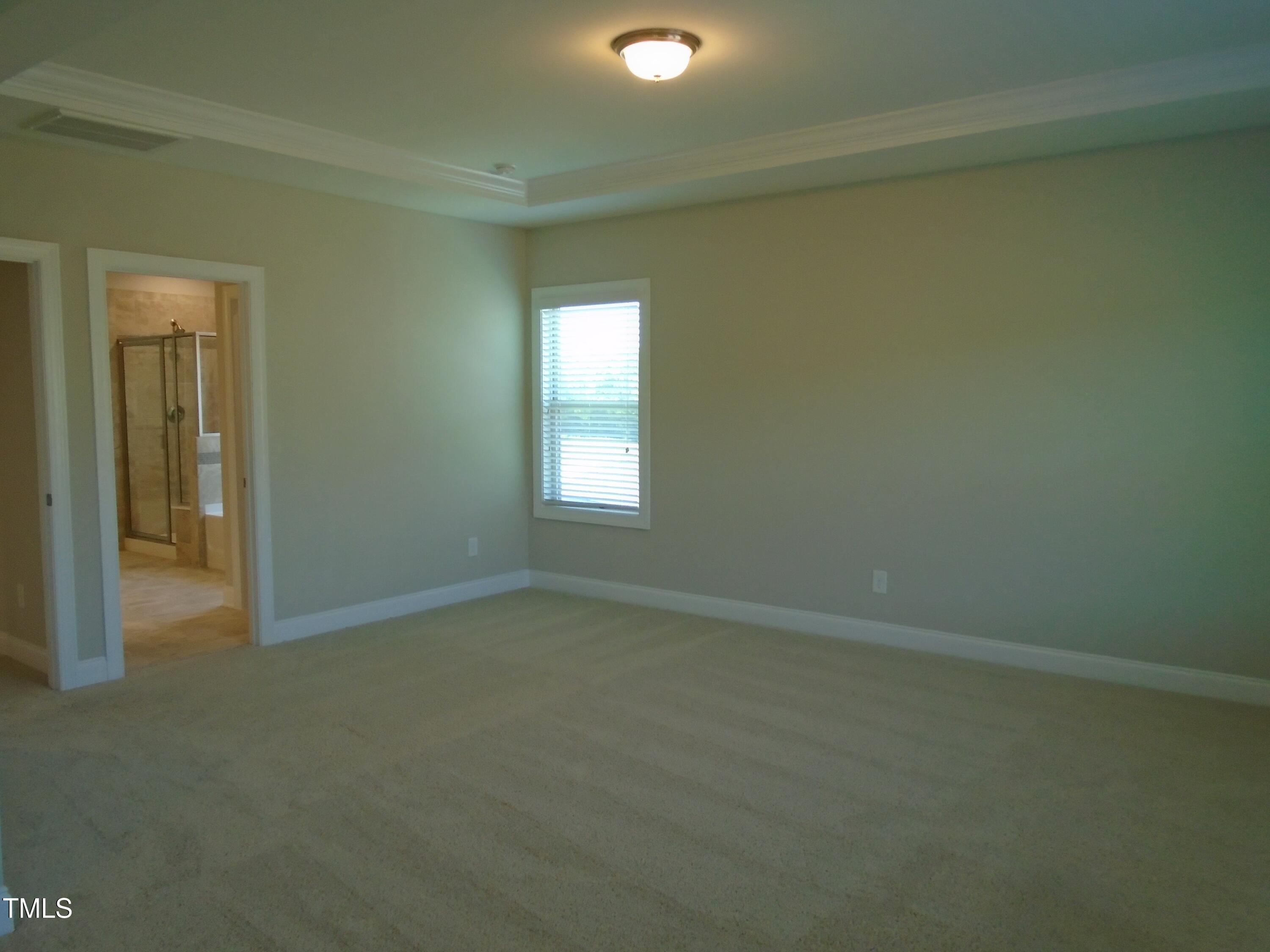 1809 Capstone Drive Durham, NC 27713 - Photo 29 of 35 an empty room with a window