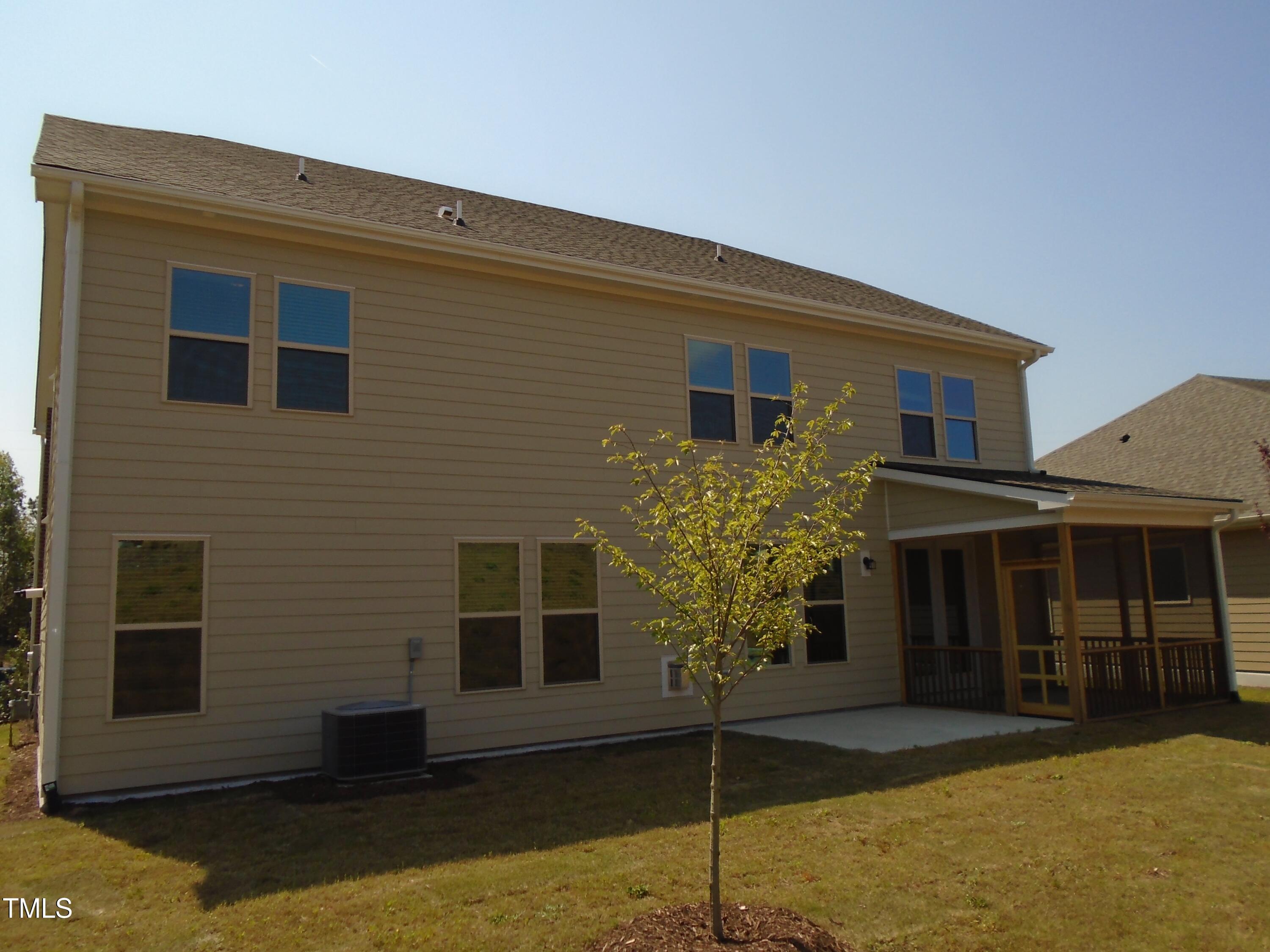 1809 Capstone Drive Durham, NC 27713 - Photo 32 of 35 a front view of a house with garden
