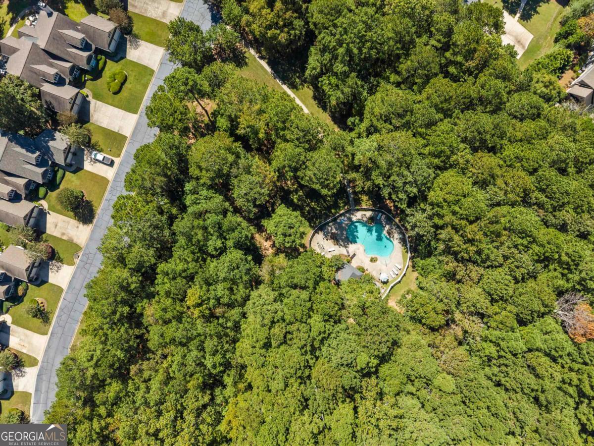 1540 Vintage Club Road Greensboro, GA 30642 - Photo 12 of 71 an aerial view of residential house with outdoor space and trees all around