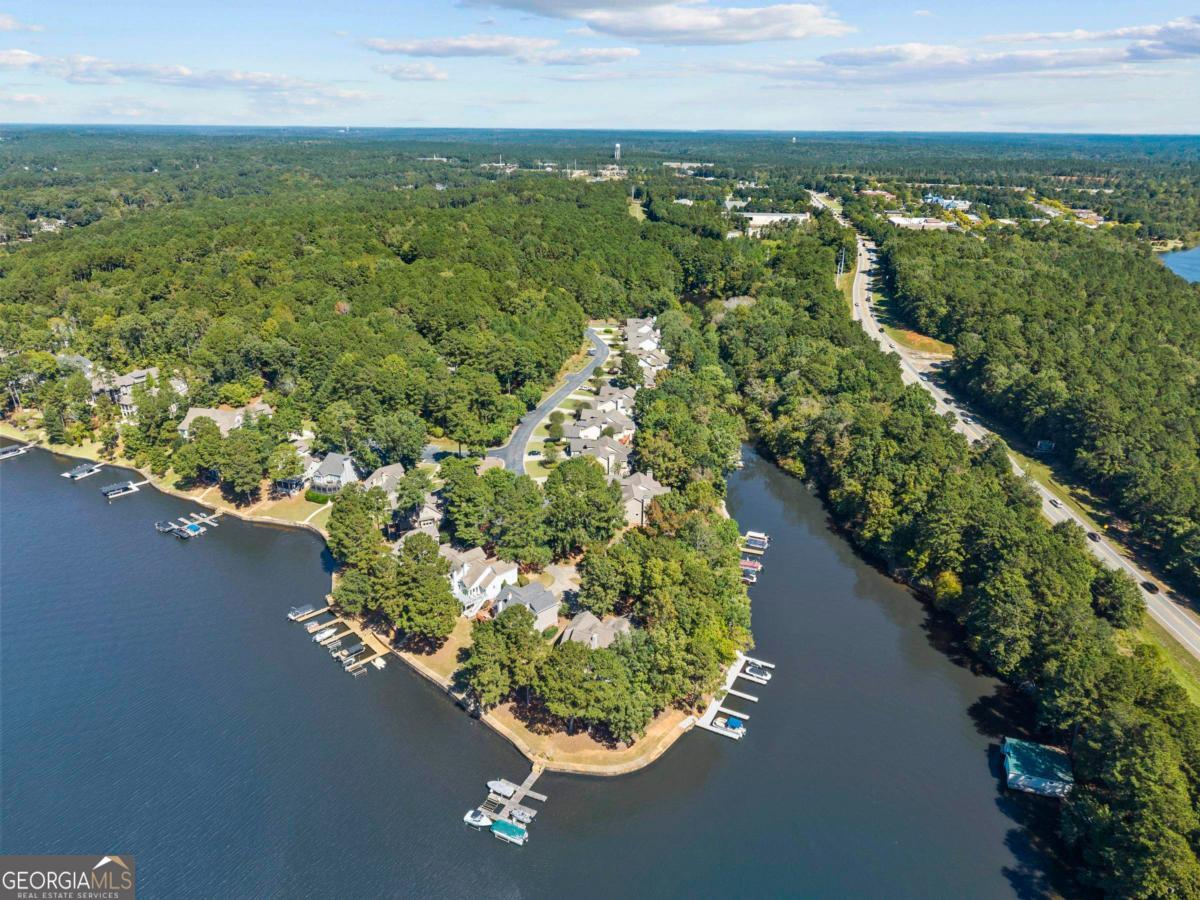 1540 Vintage Club Road Greensboro, GA 30642 - Photo 13 of 71 an aerial view of residential houses with outdoor space and trees