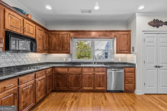 a living room with furniture a dining table and a piano