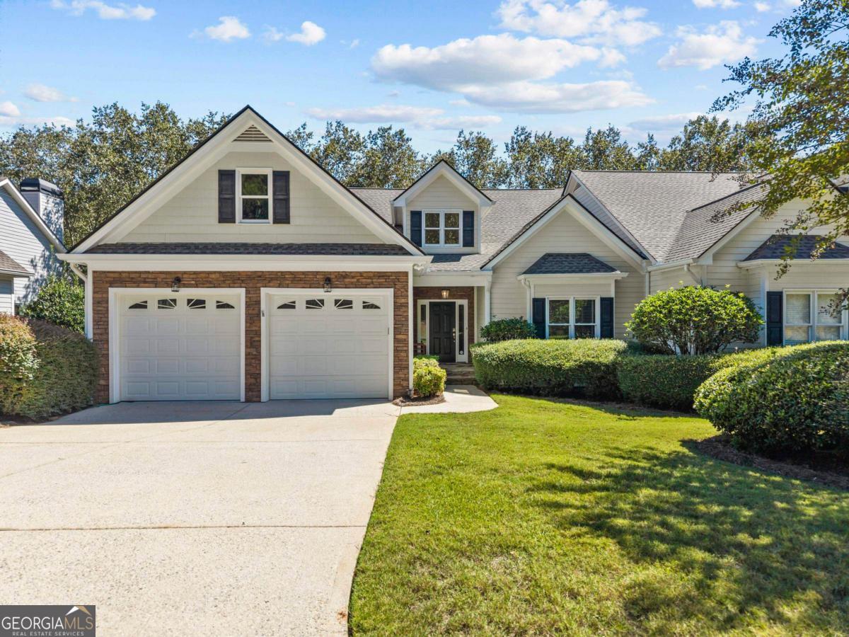 1540 Vintage Club Road Greensboro, GA 30642 - Photo 3 of 71 a front view of a house with garden