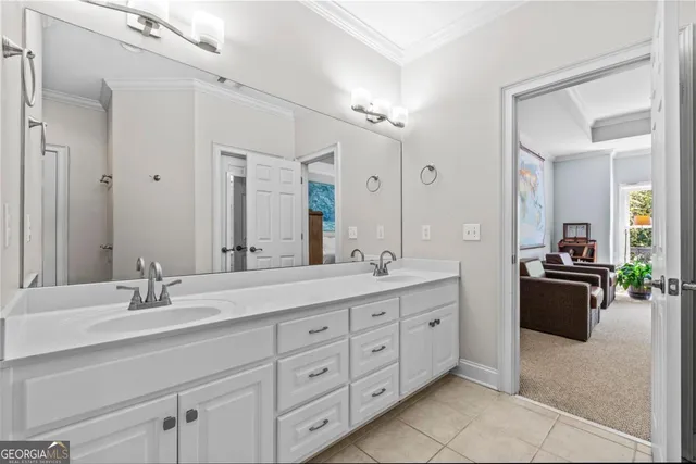 a view of an entryway with workspace and livingroom view