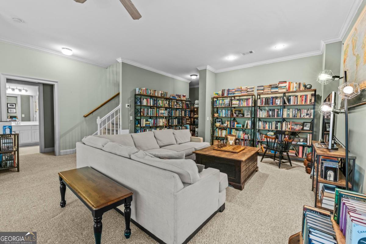 1540 Vintage Club Road Greensboro, GA 30642 - Photo 51 of 71 a living room with furniture and a flat screen tv