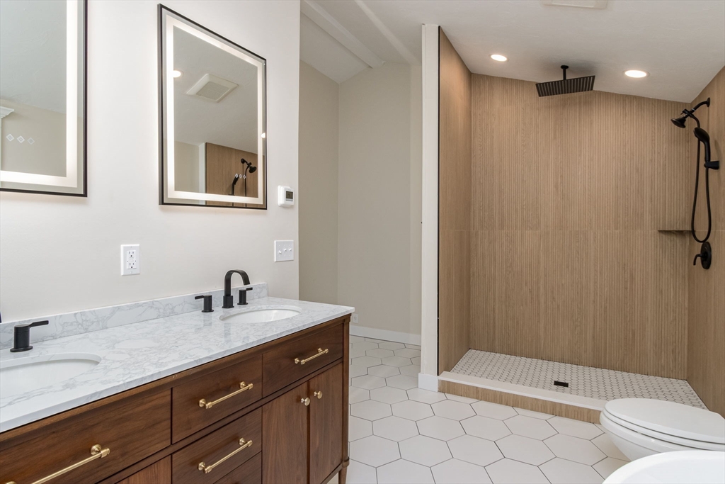 97 Old Mill Road Harvard, MA 01451 - Photo 20 of 29 a bathroom with a sink a toilet and shower