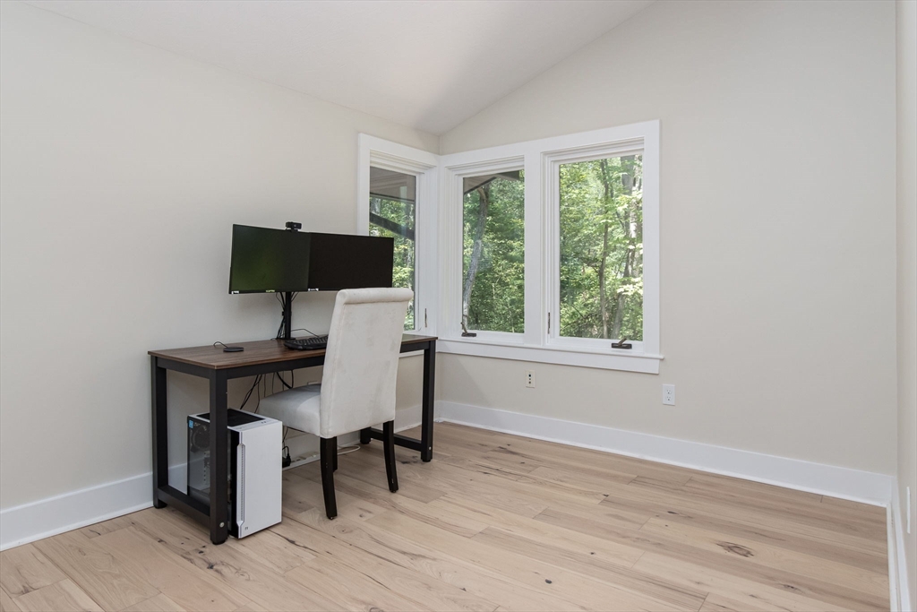 97 Old Mill Road Harvard, MA 01451 - Photo 24 of 29 a view of a workspace with furniture and a window
