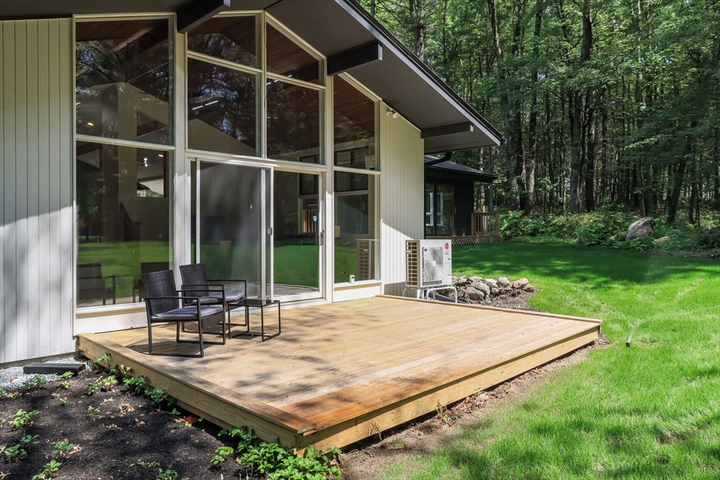 97 Old Mill Road Harvard, MA 01451 - Photo 26 of 29 a view of a house with backyard and sitting area
