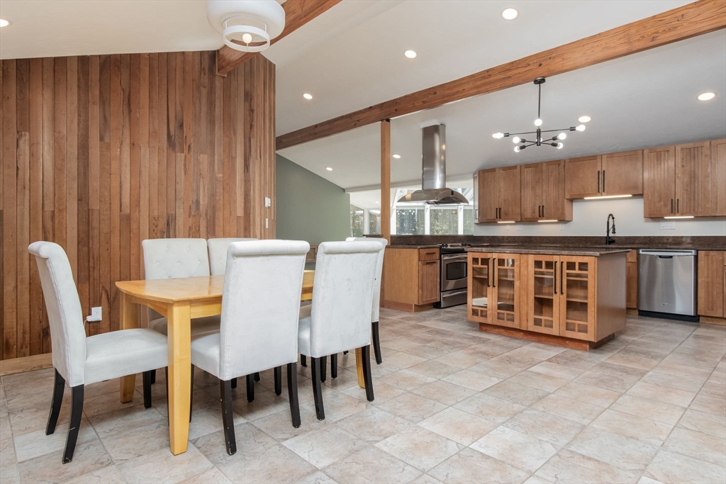 97 Old Mill Road Harvard, MA 01451 - Photo 6 of 29 a large kitchen with a table and chairs