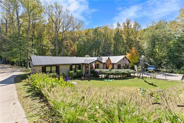 a view of a house with swimming pool