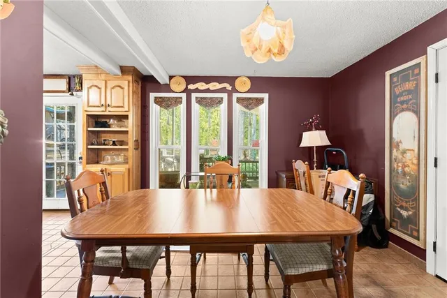 a view of a workspace with furniture and toys