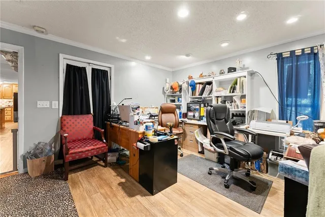 a bathroom with a toilet a sink and a window