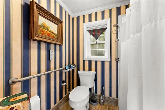 a bed room with a bed and a walk in closet