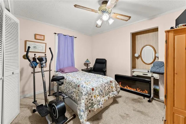 a view of a house with a yard and garage