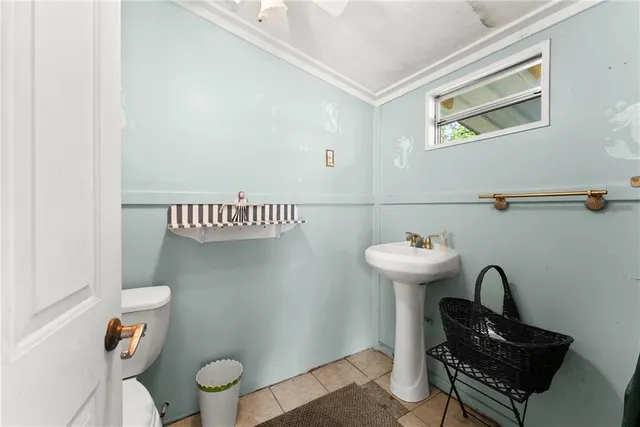 a view of a house with a yard porch and sitting area