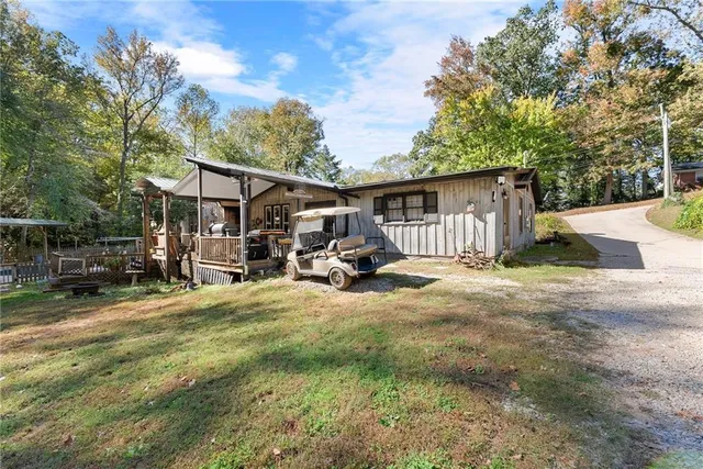 a backyard of a house with lots of green space