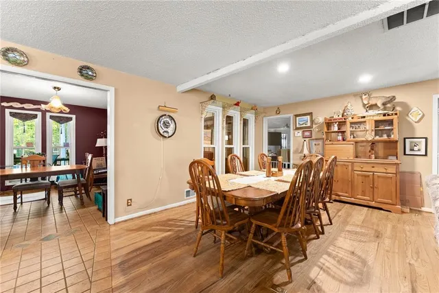 a kitchen with a sink and refrigerator
