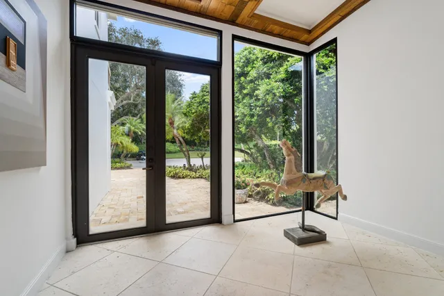 a kitchen with lots of counter top space and stainless steel appliances