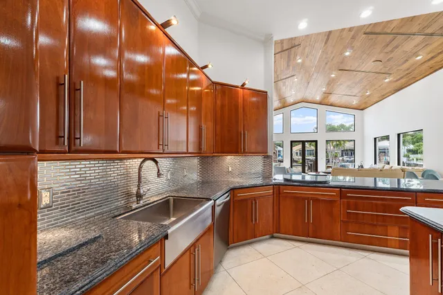 an aerial view of a house with a swimming pool