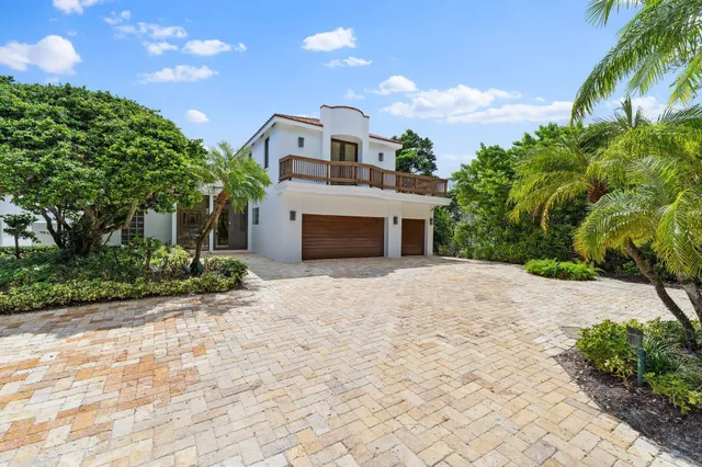 a living room with furniture ceiling fan and rug