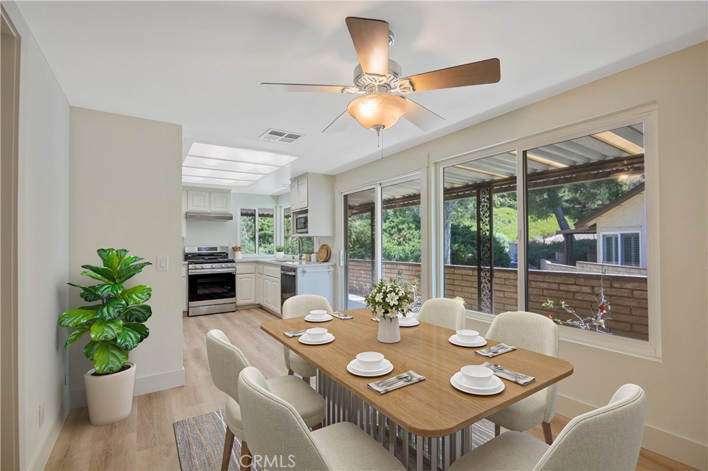 26574 Cardwick Court Newhall, CA 91321 - Photo 6 of 43 Virtually Staged Kitchen-Dining Area