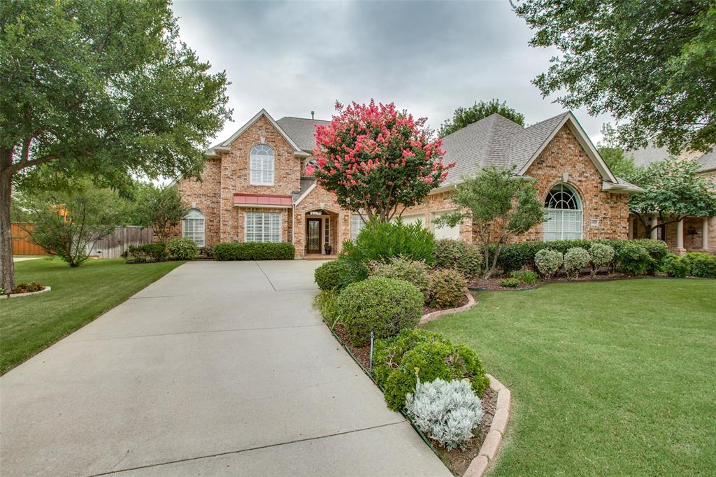 1401 Berwick Drive McKinney, TX 75072 - Photo 1 of 1 a front view of a house with garden