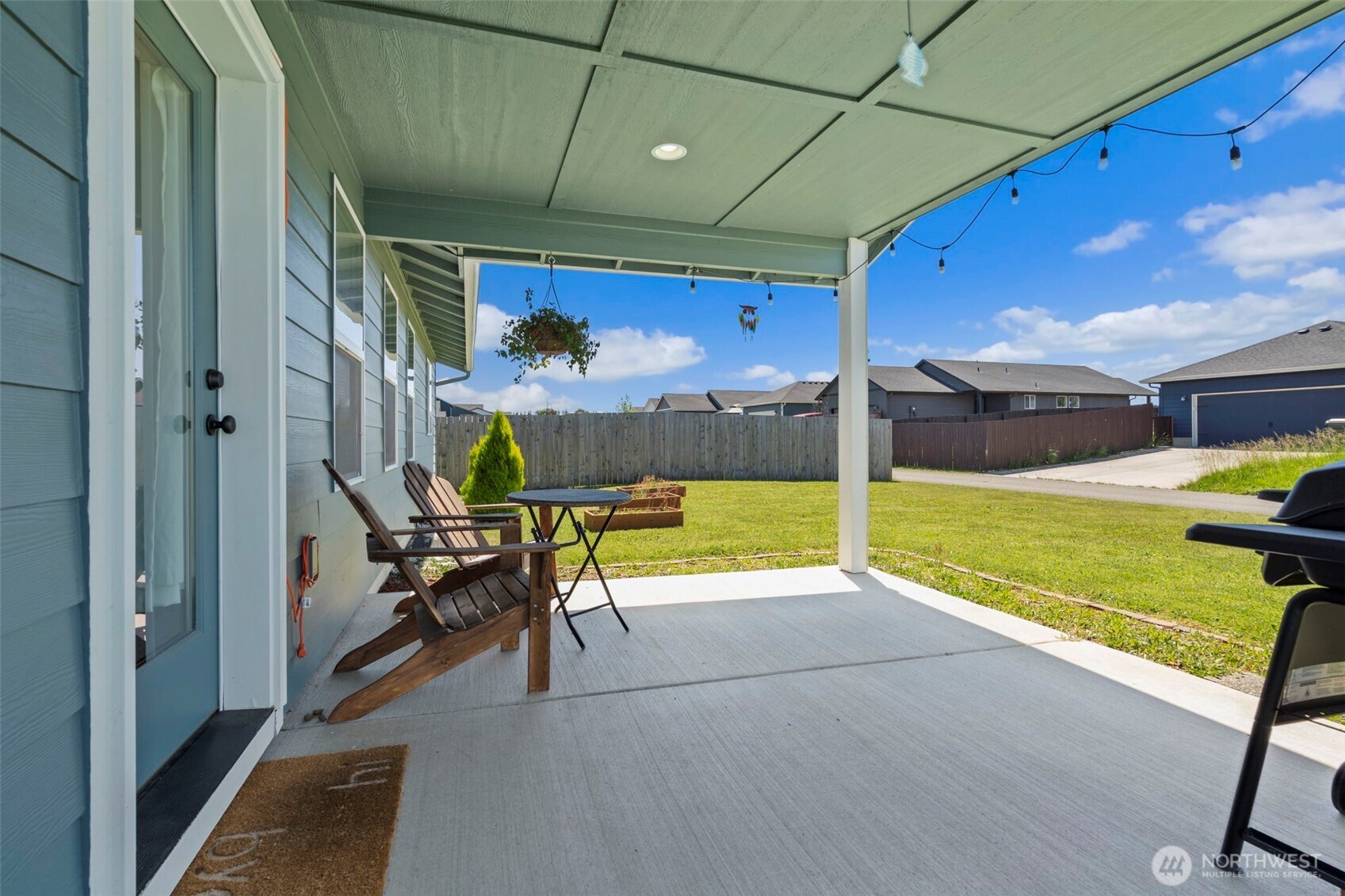 401 Cardinal Avenue Winlock, WA 98596 - Photo 26 of 39 a view of swimming pool with a patio