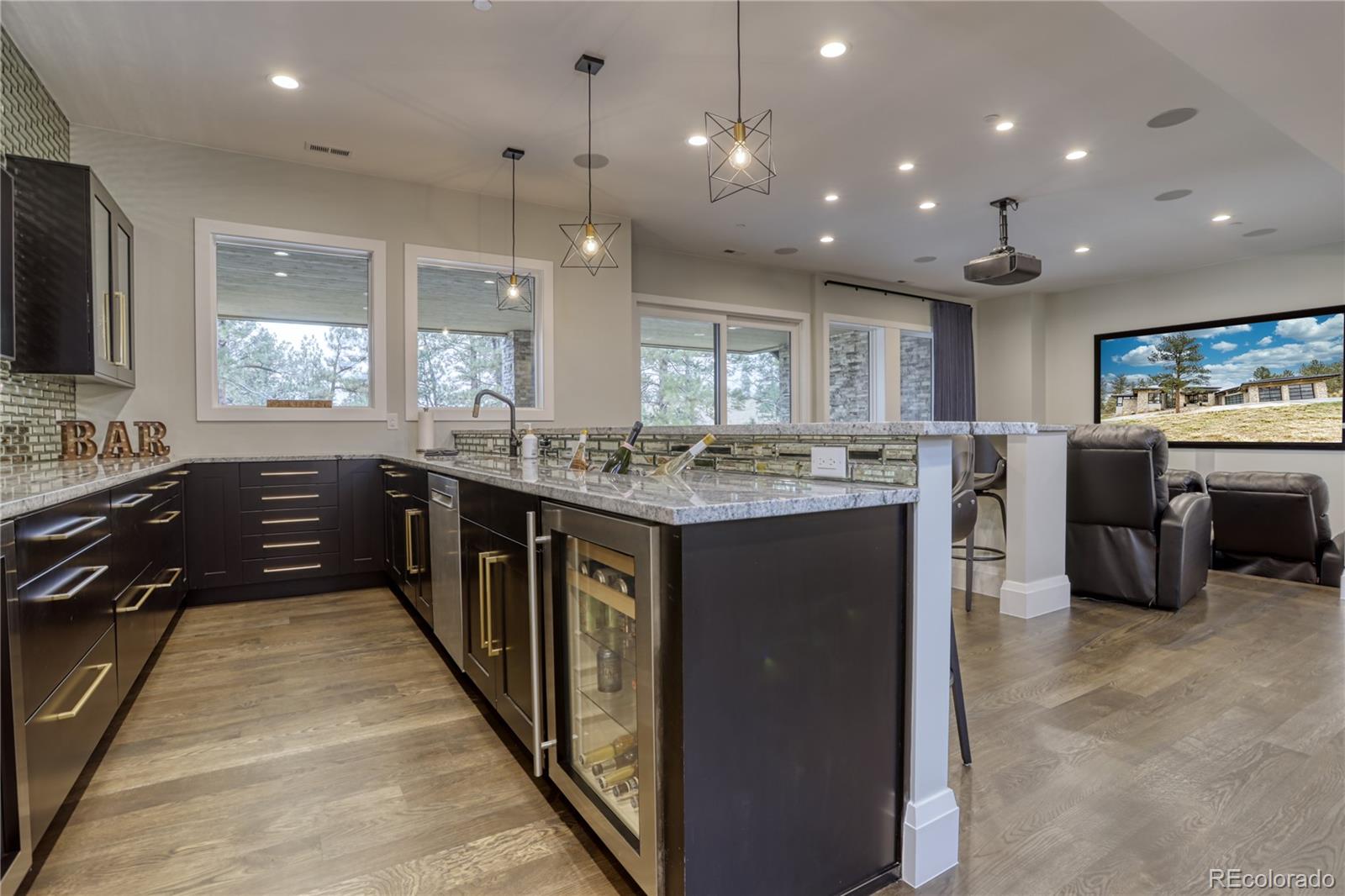 7865 Forest Keep Circle Parker, CO 80134 - Photo 25 of 40 a large kitchen with stainless steel appliances lots of counter top space