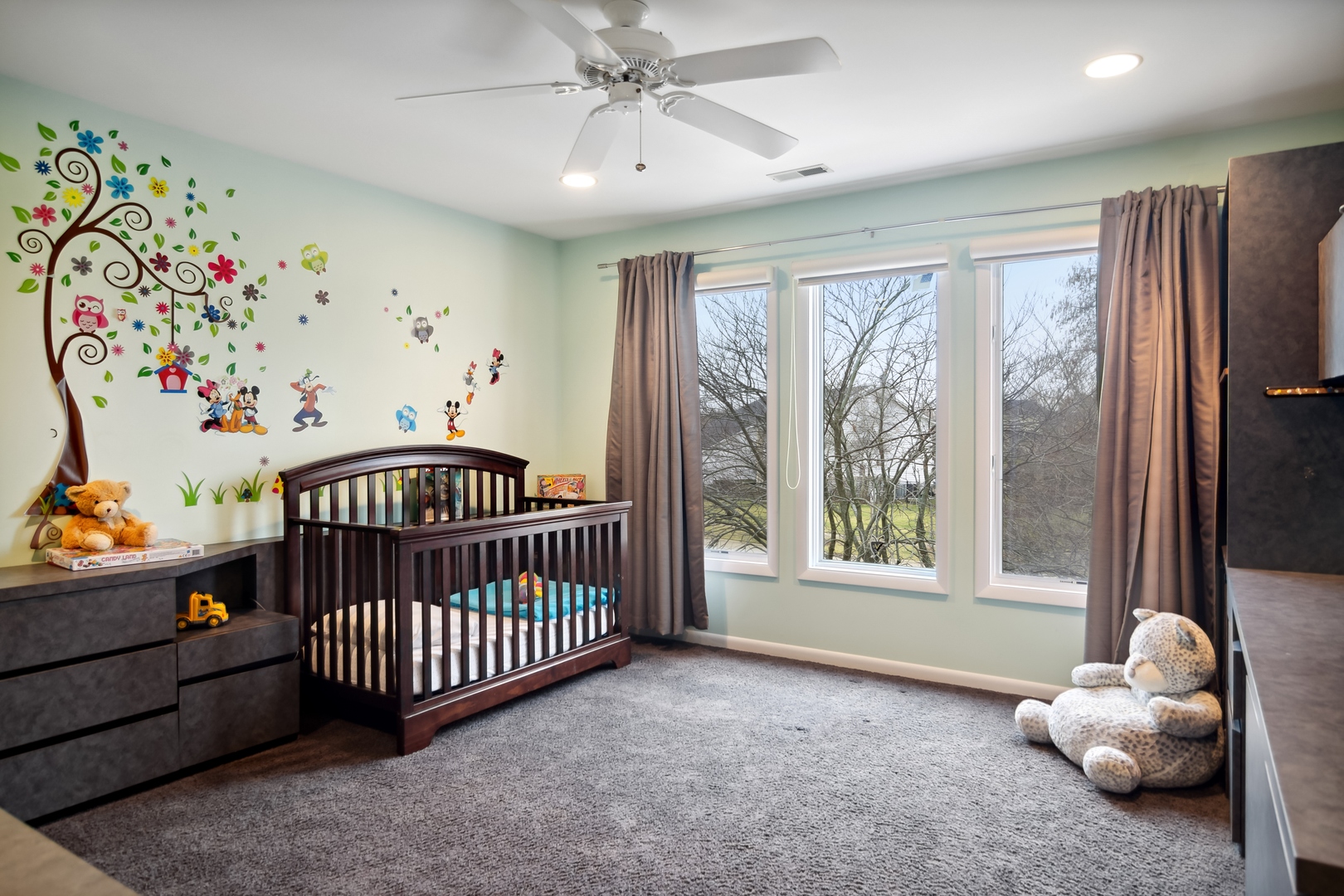 1911 Sheridan Road Buffalo Grove, IL 60089 - Photo 18 of 33 a bedroom with baby crib and a window
