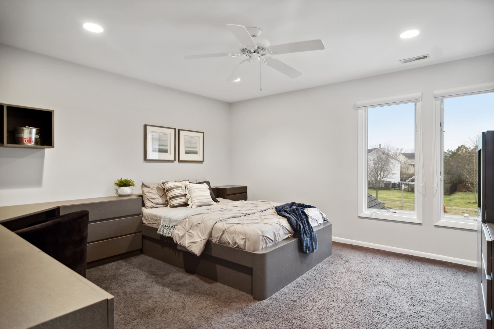 1911 Sheridan Road Buffalo Grove, IL 60089 - Photo 20 of 33 a bedroom with bed and a large window