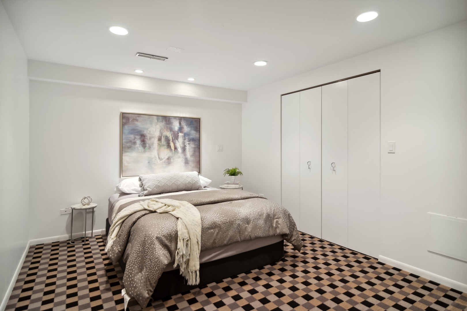 1911 Sheridan Road Buffalo Grove, IL 60089 - Photo 22 of 33 a bedroom with a bed and a black white wall