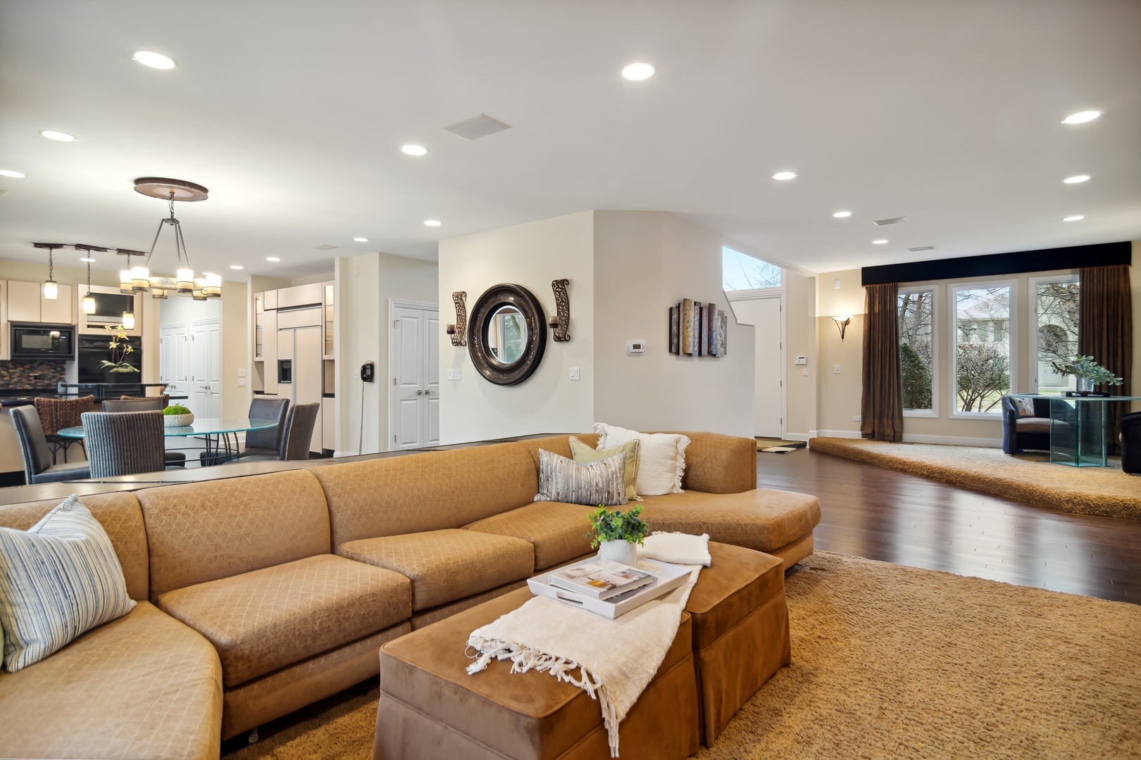 1911 Sheridan Road Buffalo Grove, IL 60089 - Photo 7 of 33 a living room with furniture and a view of kitchen