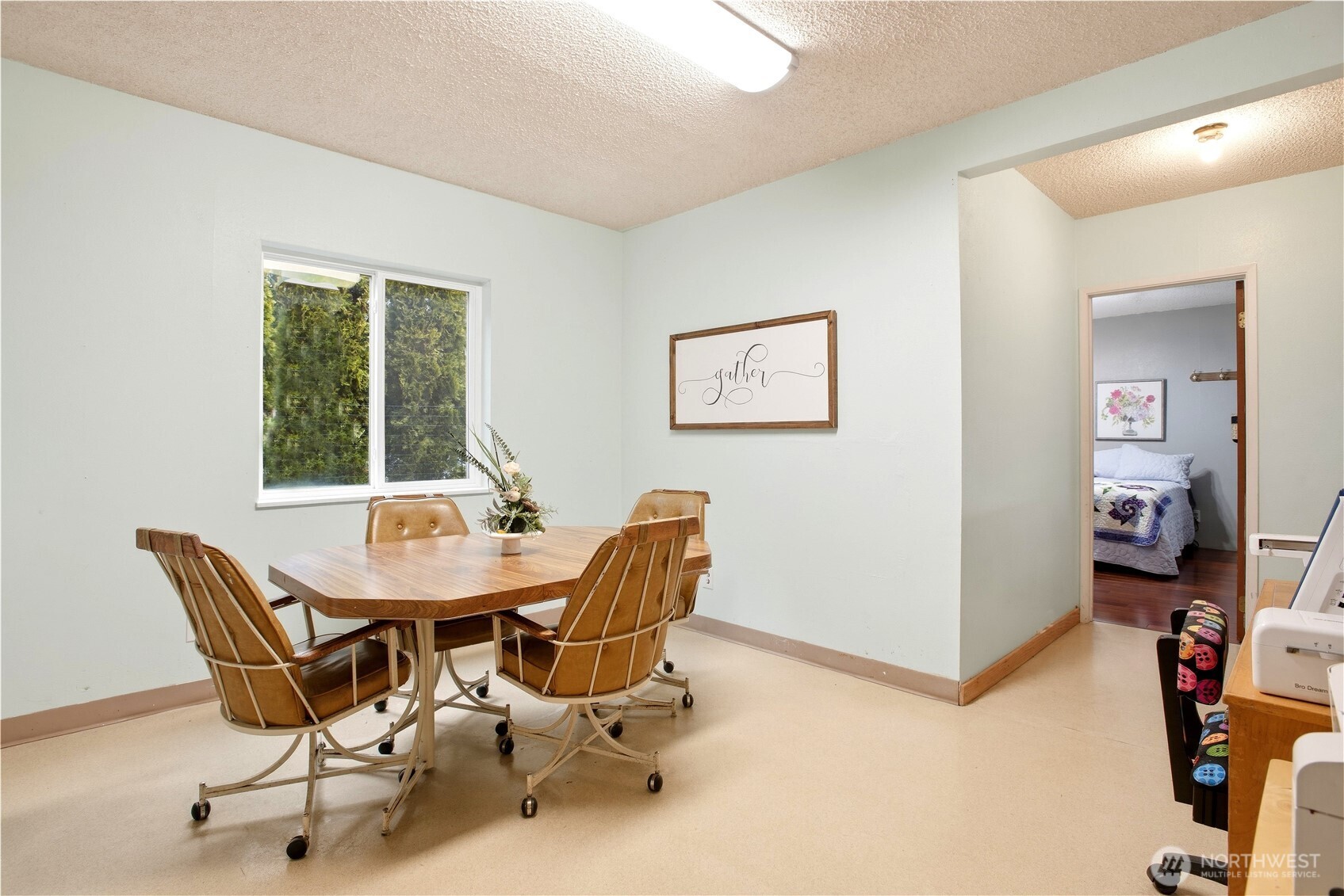 3506 Columbia Heights Road Longview, WA 98632 - Photo 11 of 22 a view of a dining room with furniture and a window
