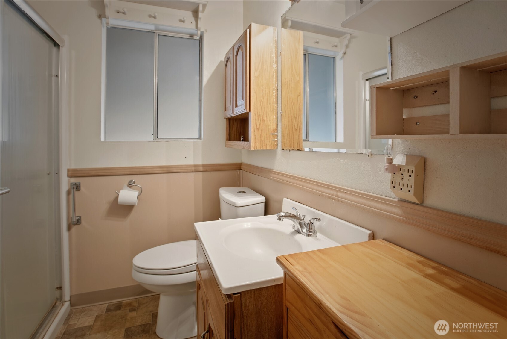 3506 Columbia Heights Road Longview, WA 98632 - Photo 12 of 22 a bathroom with a sink toilet and mirror