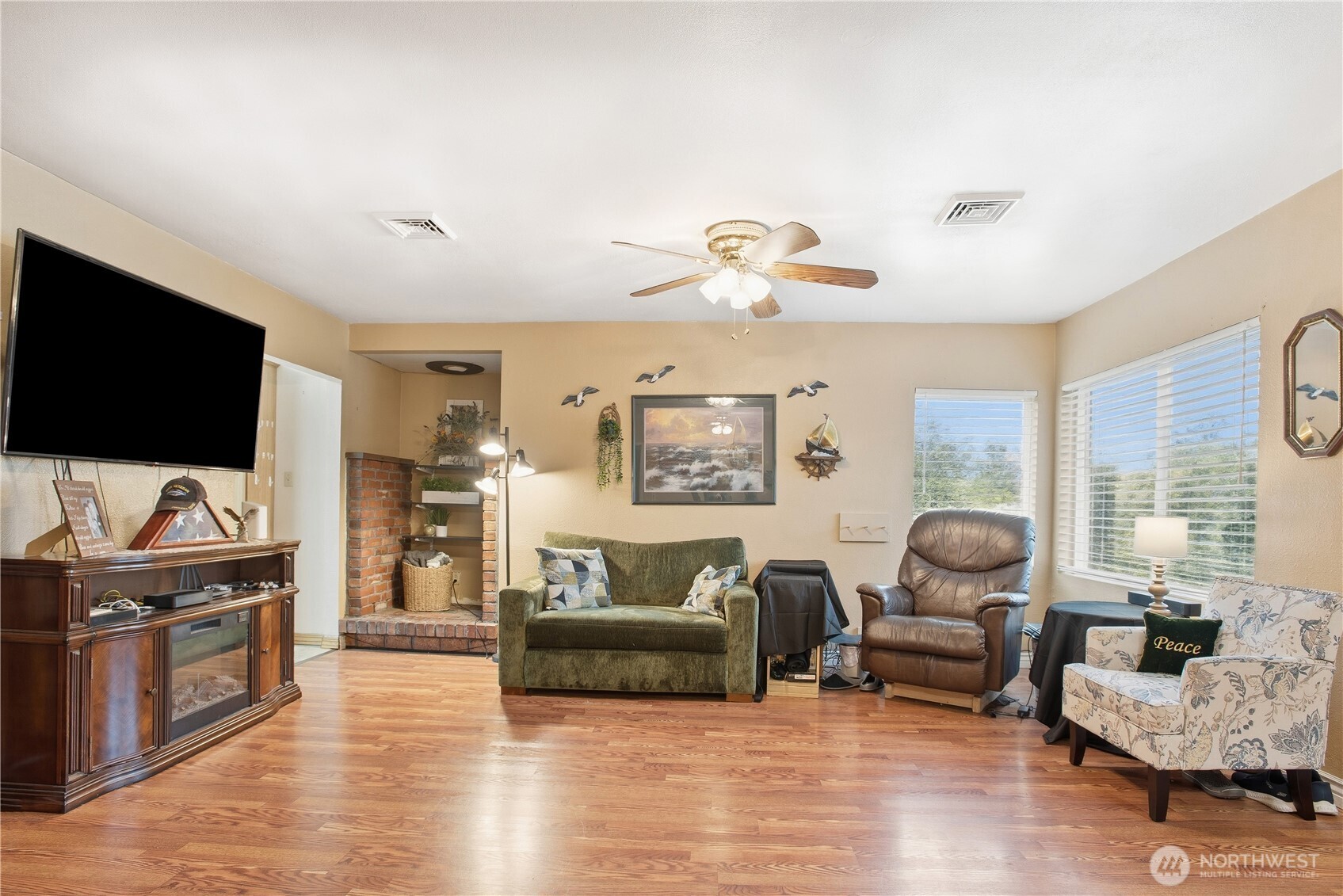 3506 Columbia Heights Road Longview, WA 98632 - Photo 5 of 22 a living room with furniture and a flat screen tv