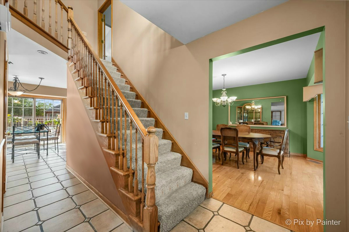 4319 Mc Cauley Road Woodstock, IL 60098 - Photo 19 of 52 a view of entryway and hall with dining room