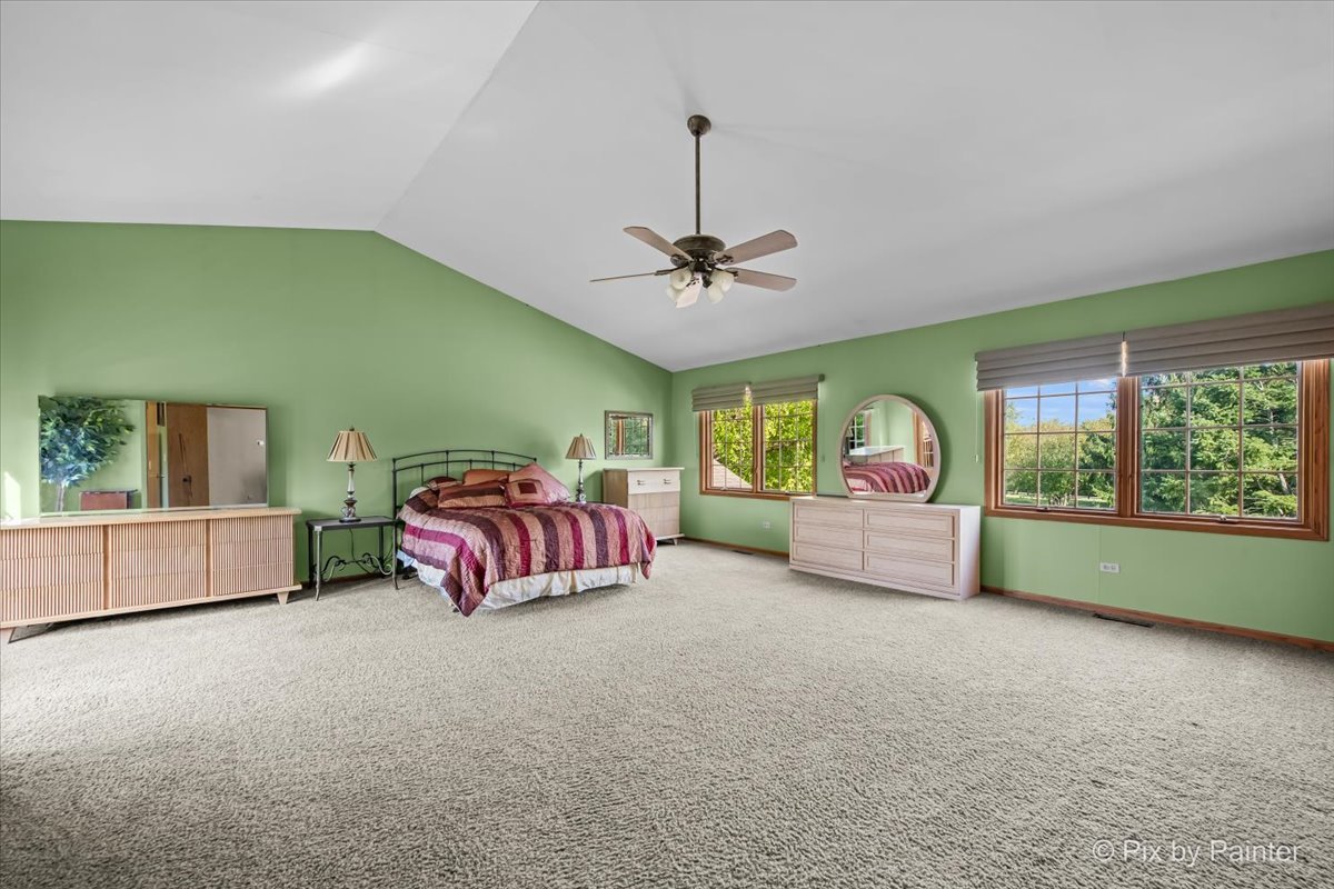 4319 Mc Cauley Road Woodstock, IL 60098 - Photo 21 of 52 a bedroom with furniture and a large window