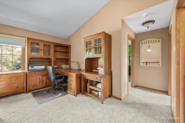 a spacious bathroom with a double vanity sink a mirror and a