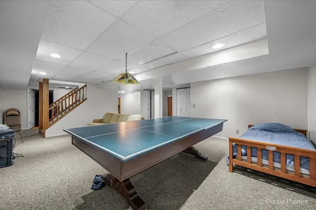 a view of a yard with a trampoline