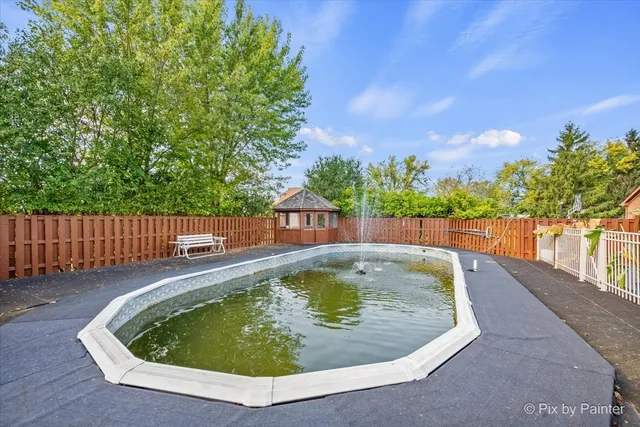 a house view with a garden space