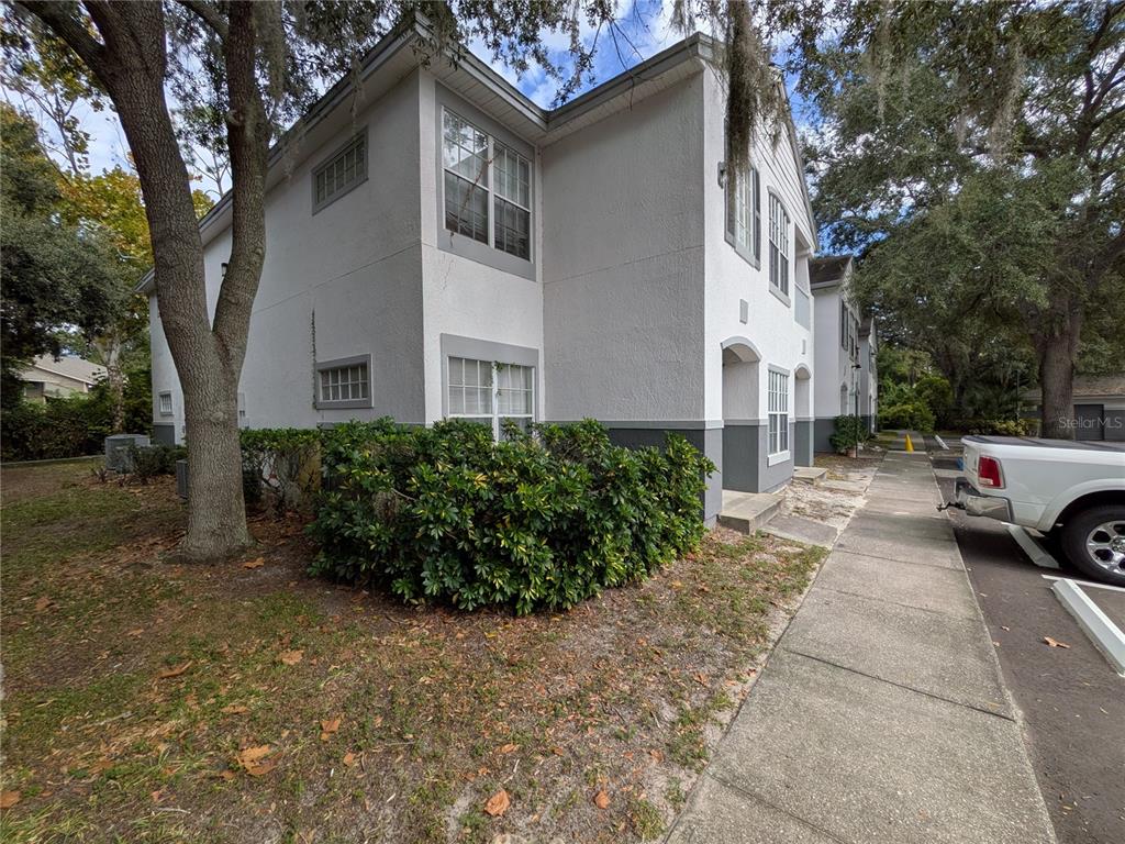 4308 South Kirkman Road, Unit 1 Orlando, FL 32811 - Photo 2 of 24 a view of a car park in front of house